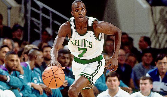 Dee Brown Boston Celtics Unsigned Sitting On Rim Holding 1991